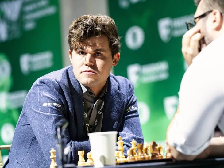 Chess champion Carlsen out of World Rapid and Blitz Championships | चेस चैंपियन कार्लसन वर्ल्ड रैपिड और ब्लिट्ज चैंपियनशिप से बाहर: ड्रेस कोर्ड के उल्लंघन पर FIDE ने नोटिस जारी किया; जुर्माना भी लगा